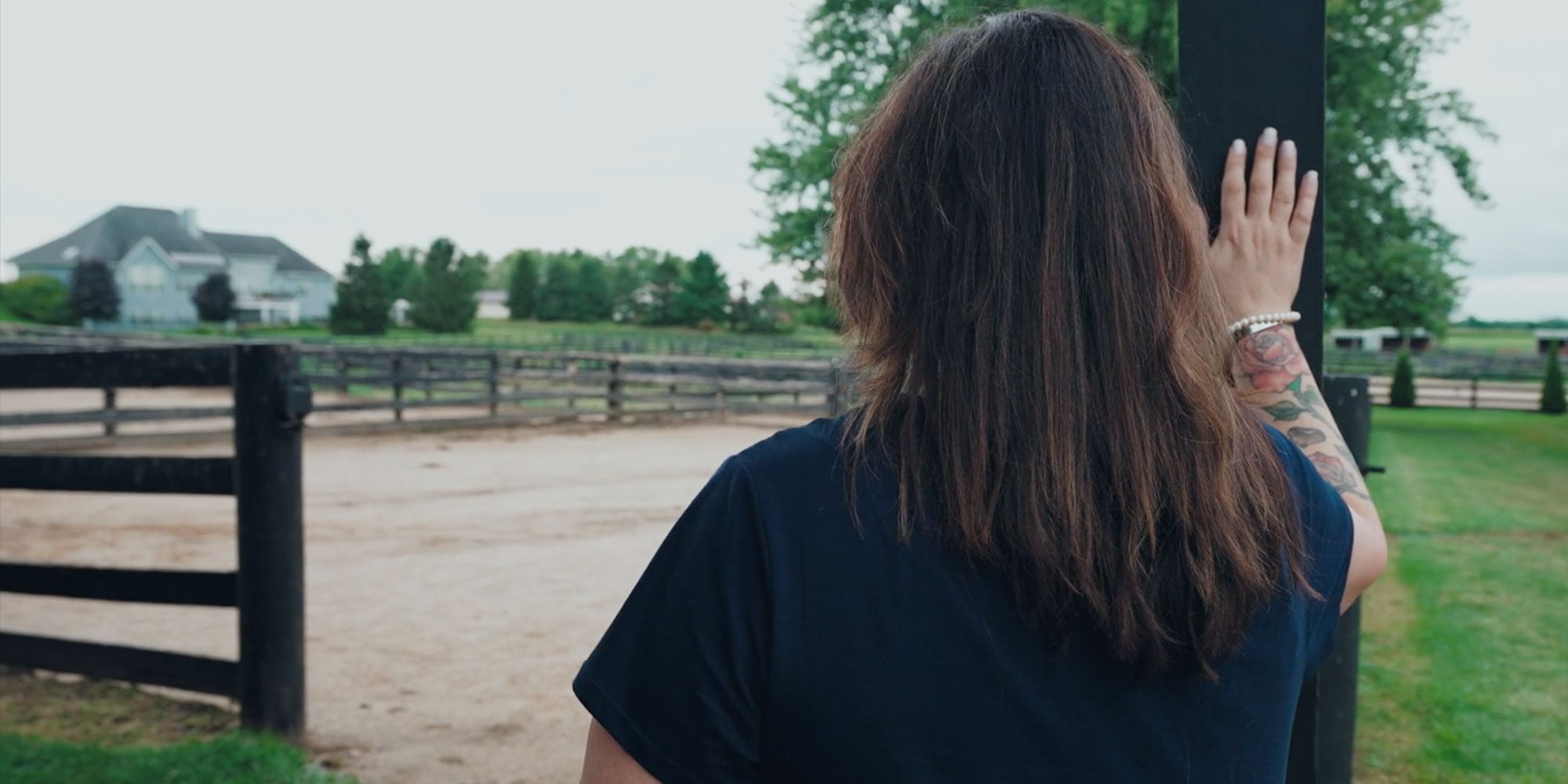 dental implant patient looking out on a large set ranch