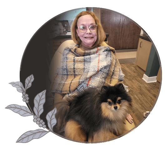 A Toothery patient holding a therapy dog
